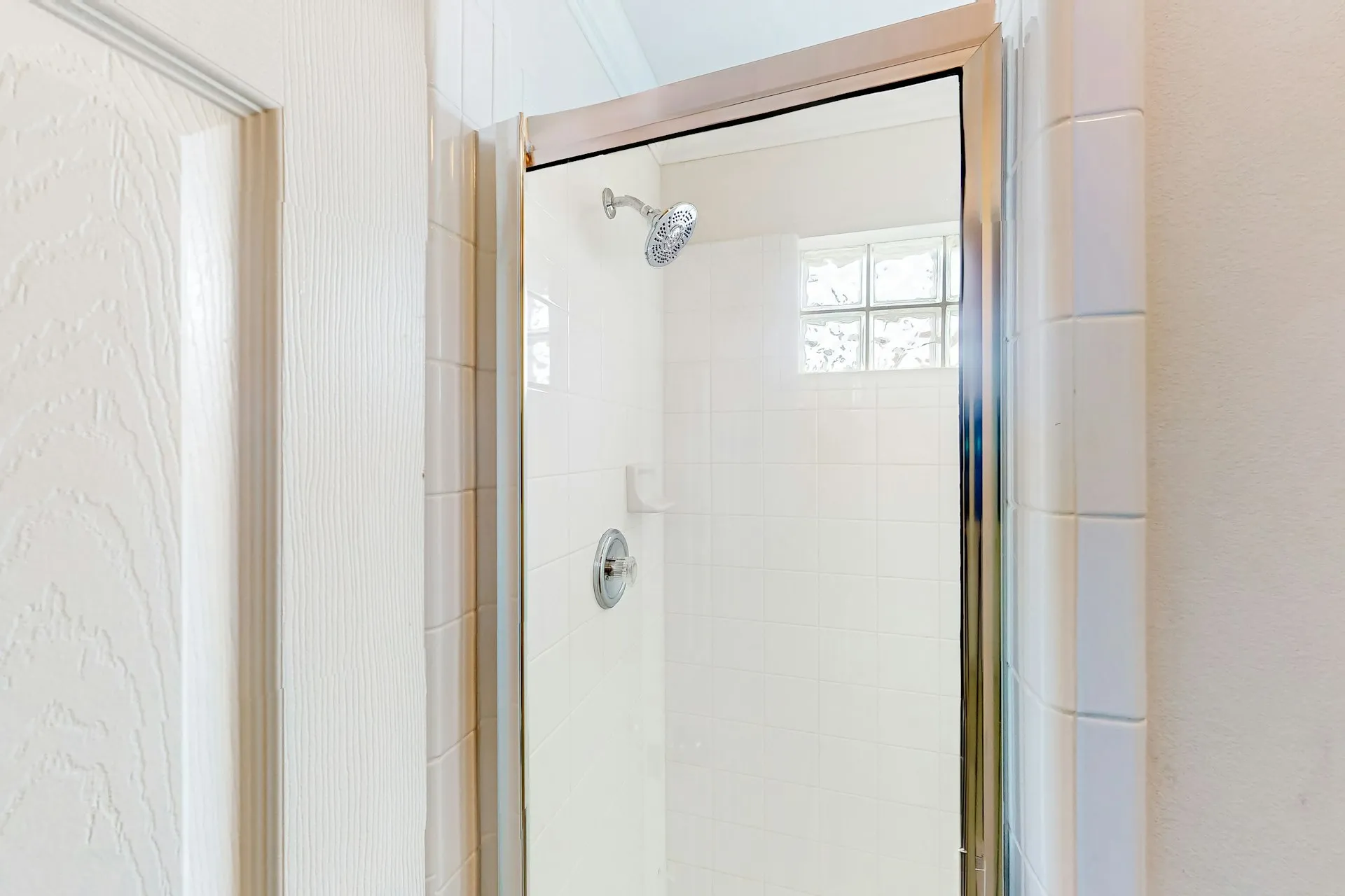 Walk-in shower with glass door