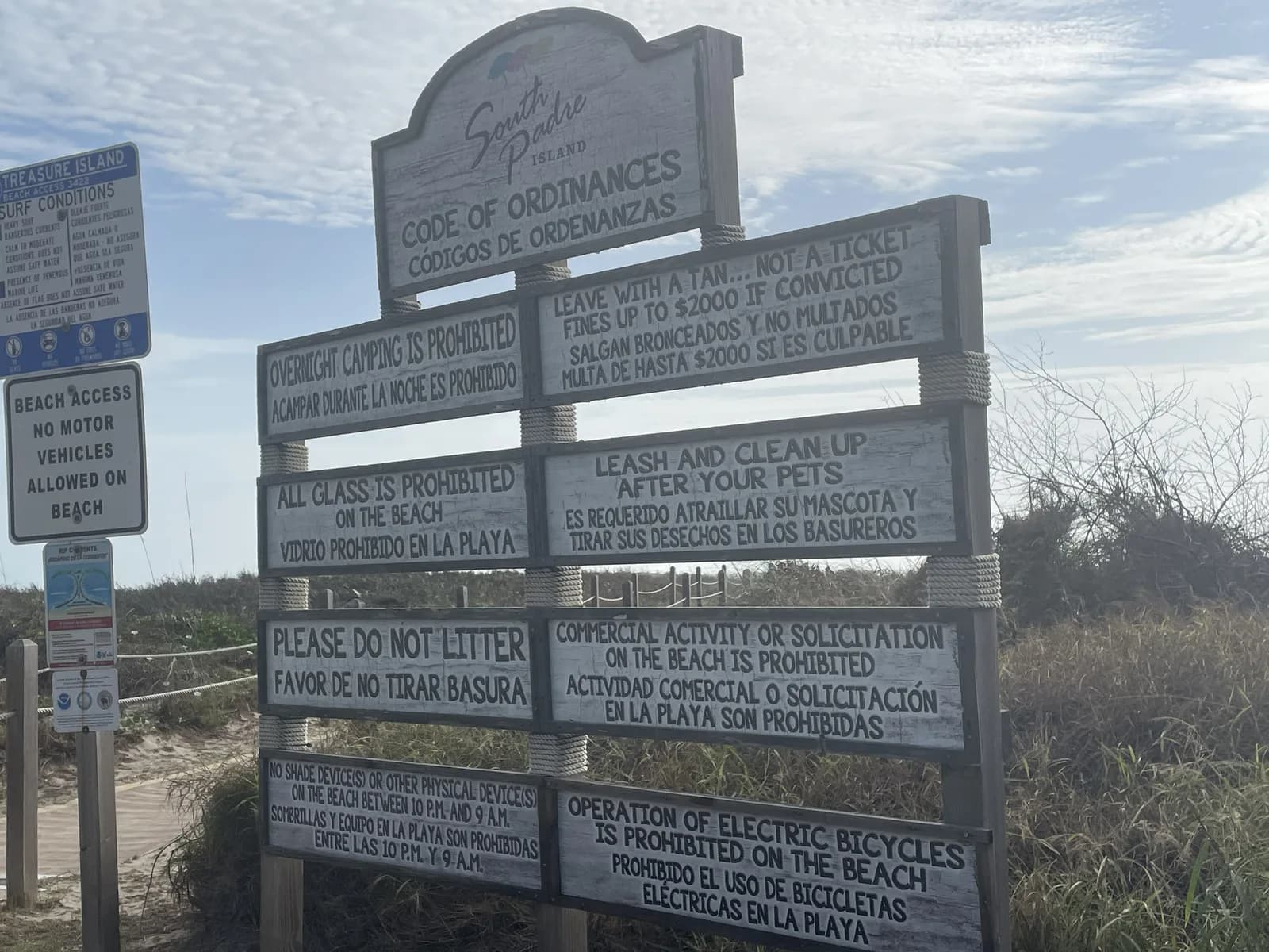 South Padre Island beach ordinances sign at the dune entrance to the boardwalk